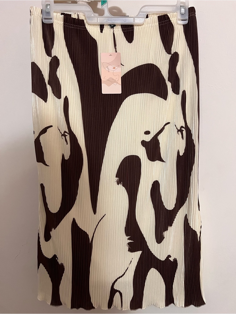 Brown and cream abstract pleated midi skirt, size large.